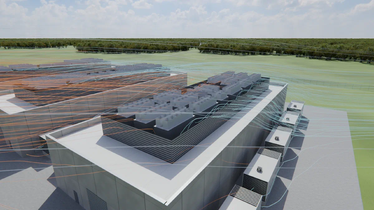 A data center building with banks of condensing units on its roof and generators along one side; blue wind lines cross the roof, and orange lines of warm air stream off the neighboring building